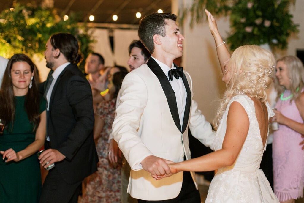 Bride and groom dancing at Riverfront wedding