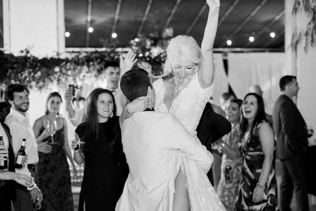 Bride and groom dancing at Riverfront wedding