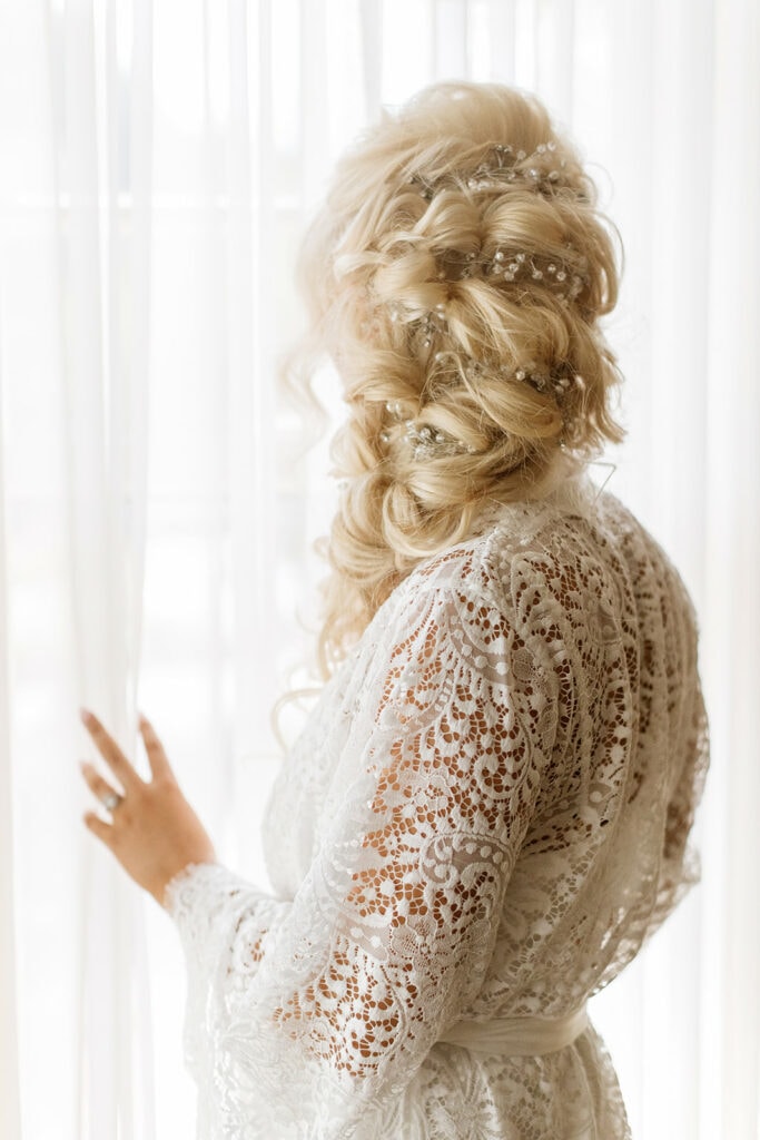 Braided bridal updo with silver hair vine