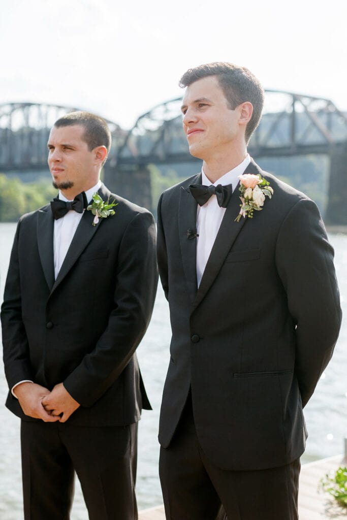 Groom's reaction to bride walking down the aisle