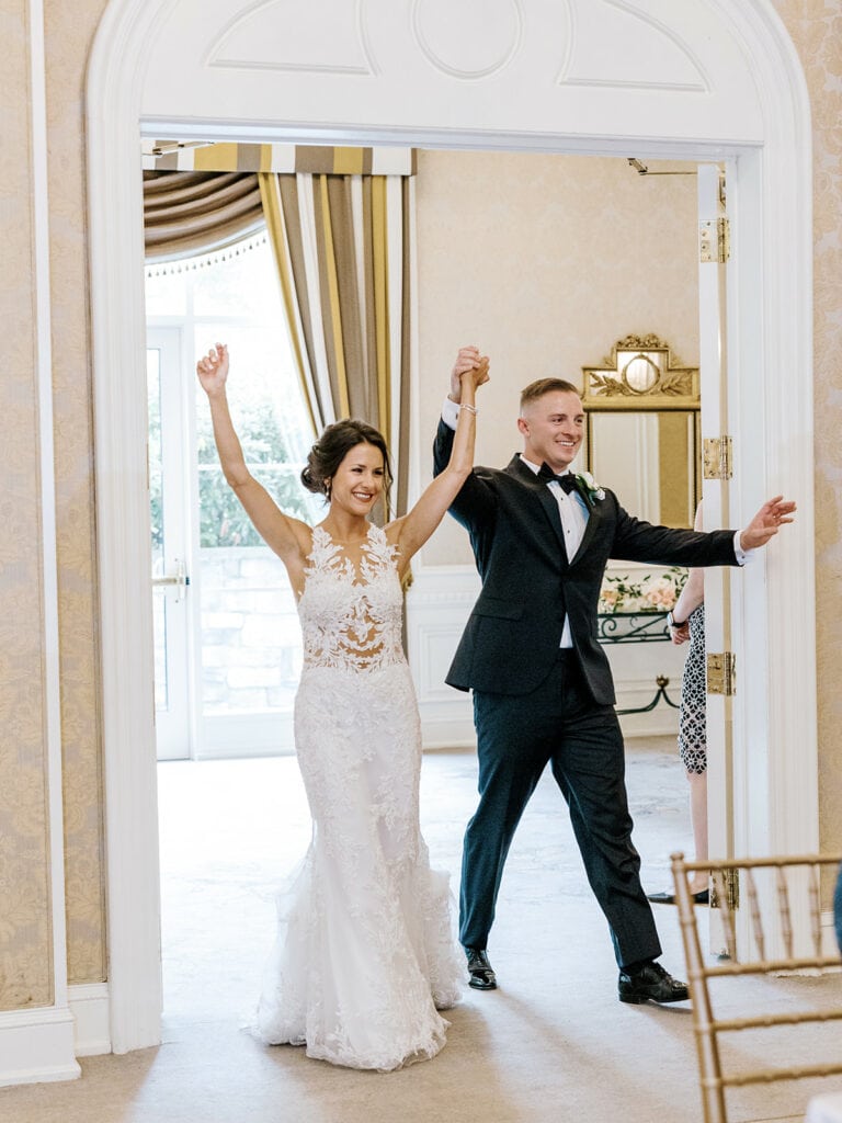 bride and groom entrance at nemacolin woodlands resort wedding