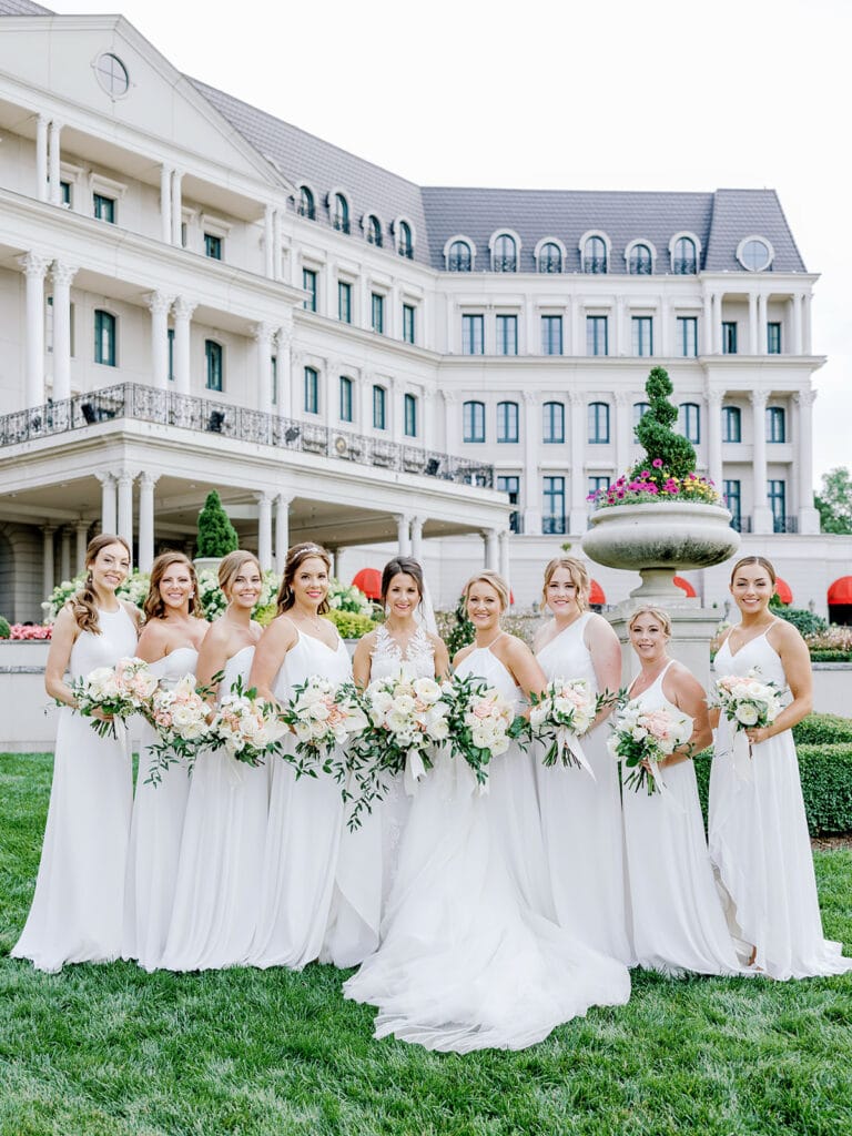 bride and bridesmaids at nemacolin woodlands resort wedding