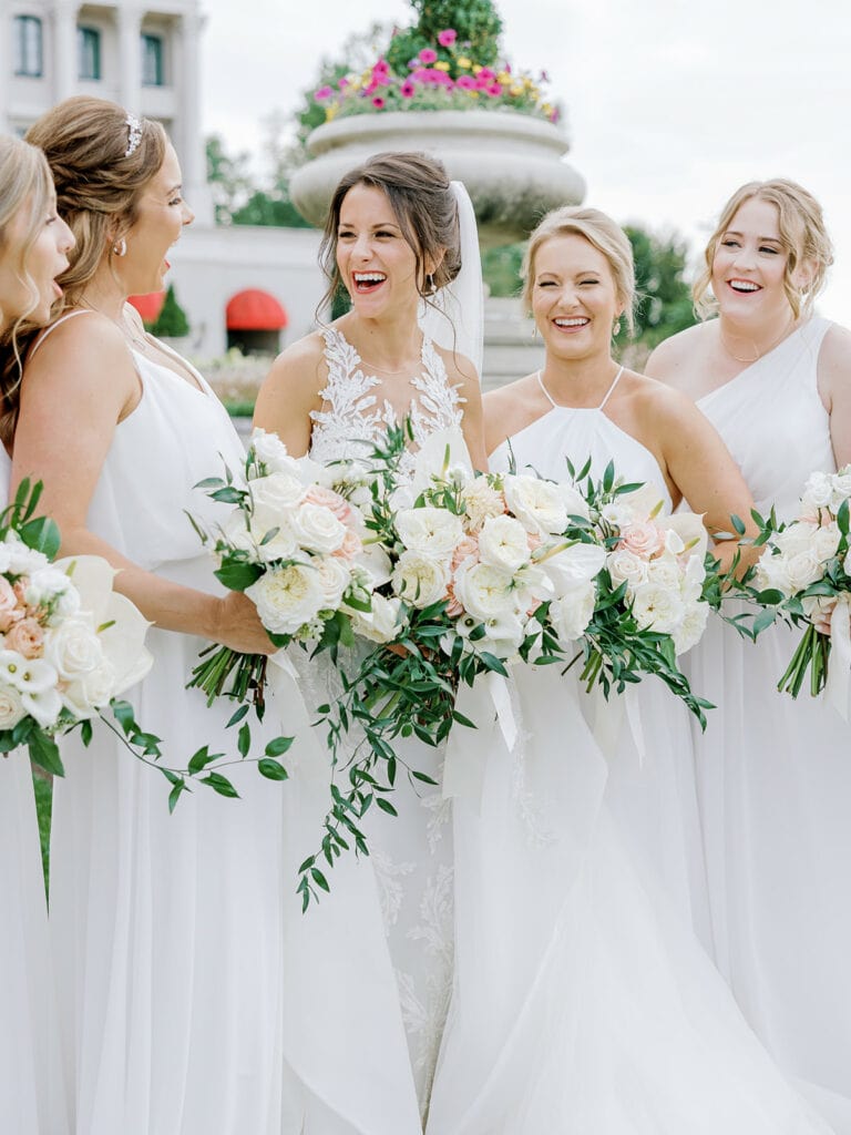 bride and bridesmaids at nemacolin woodlands resort wedding