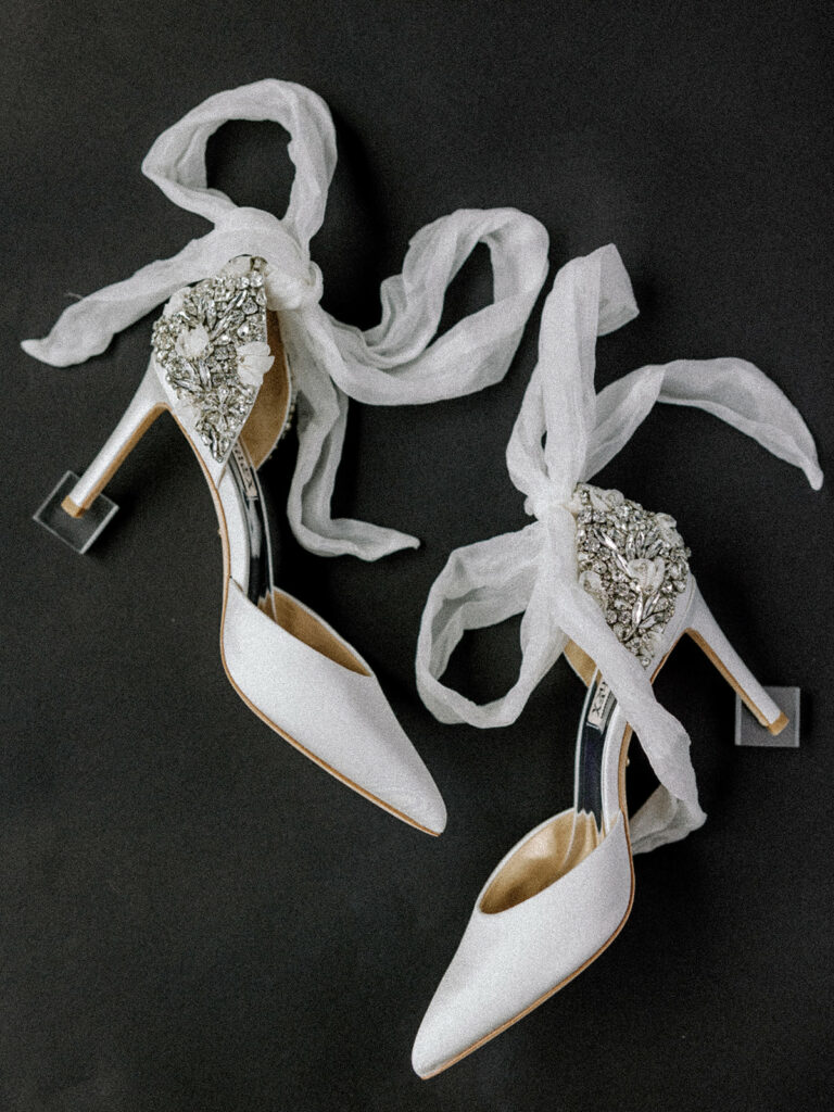 White embellished wedding shoes with bow ties