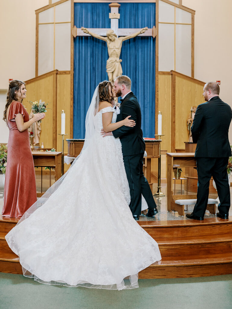 Photo of bride and groom at their Pittsburgh church wedding ceremony.