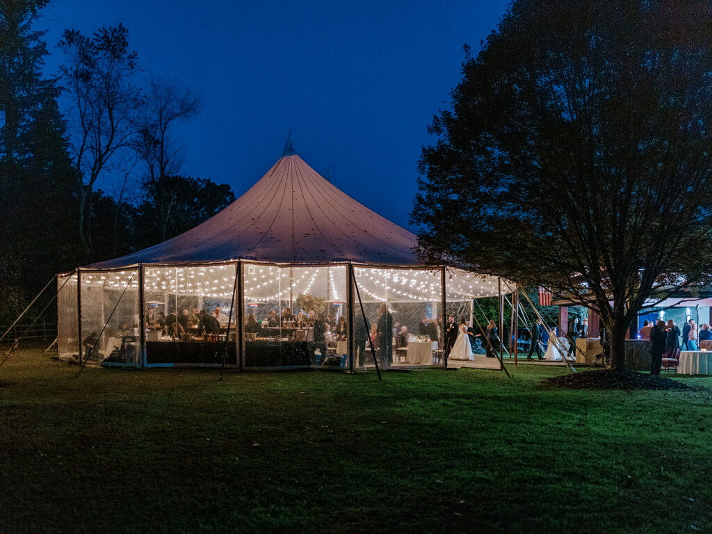 Photo of a wedding reception tent in Pittsburgh on private property. Pittsburgh Fall Tented Wedding on a Private Estate