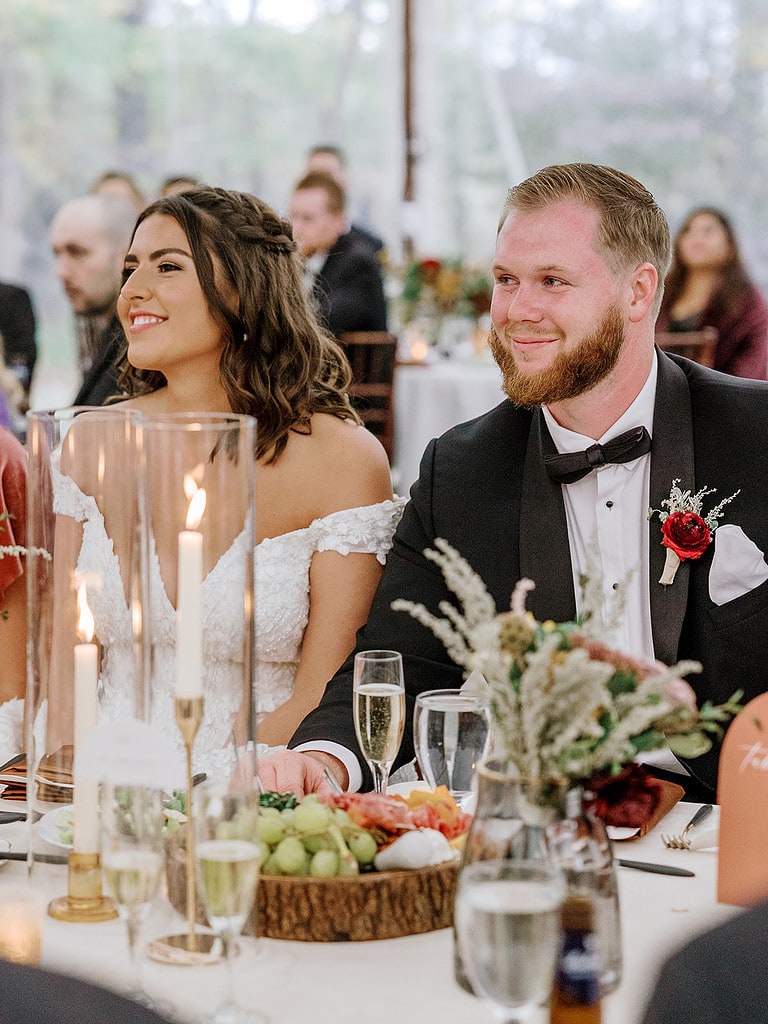 Photo of bride and groom at their wedding reception in Pittsburgh. Pittsburgh Fall Tented Wedding on a Private Estate