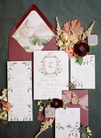 invitation design by emily mayne studios with calligraphy and water burgundy water color accents
