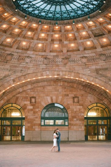 Couple embracing in the rotunda at the Pennsylvanian