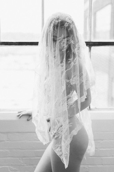 woman with a lace veil over her: Pittsburgh Boudoir Photography